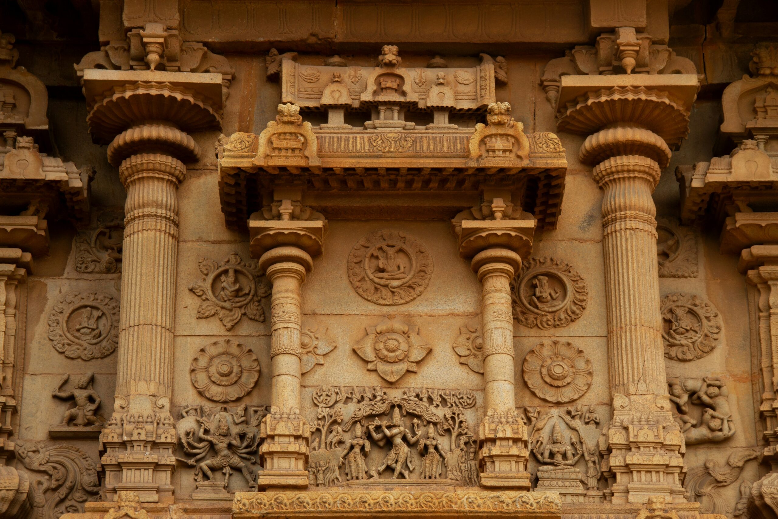 Close-up of intricate cultural carvings on a heritage structure, representing ancestral memory and reclamation